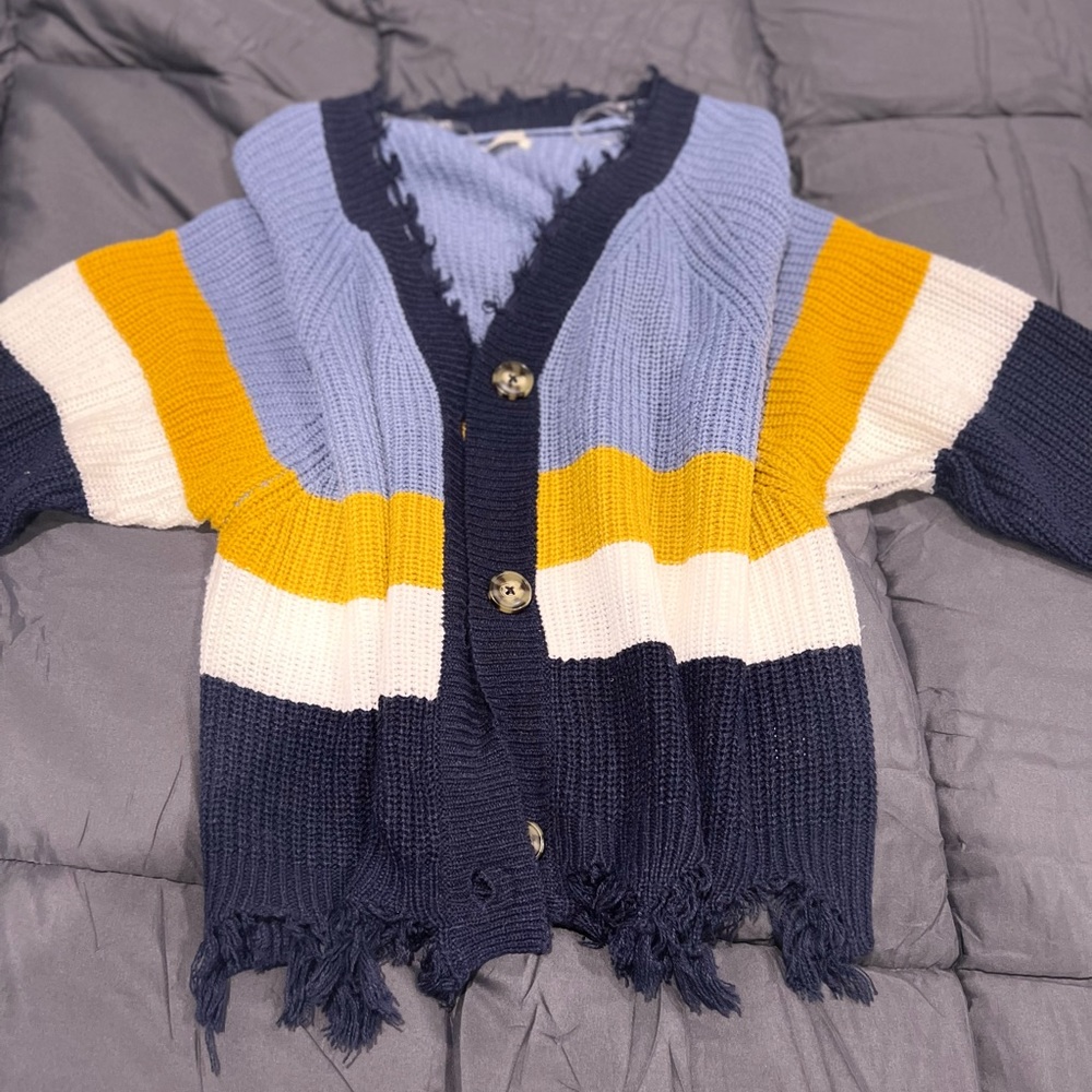 Distressed sweater, lightly worn